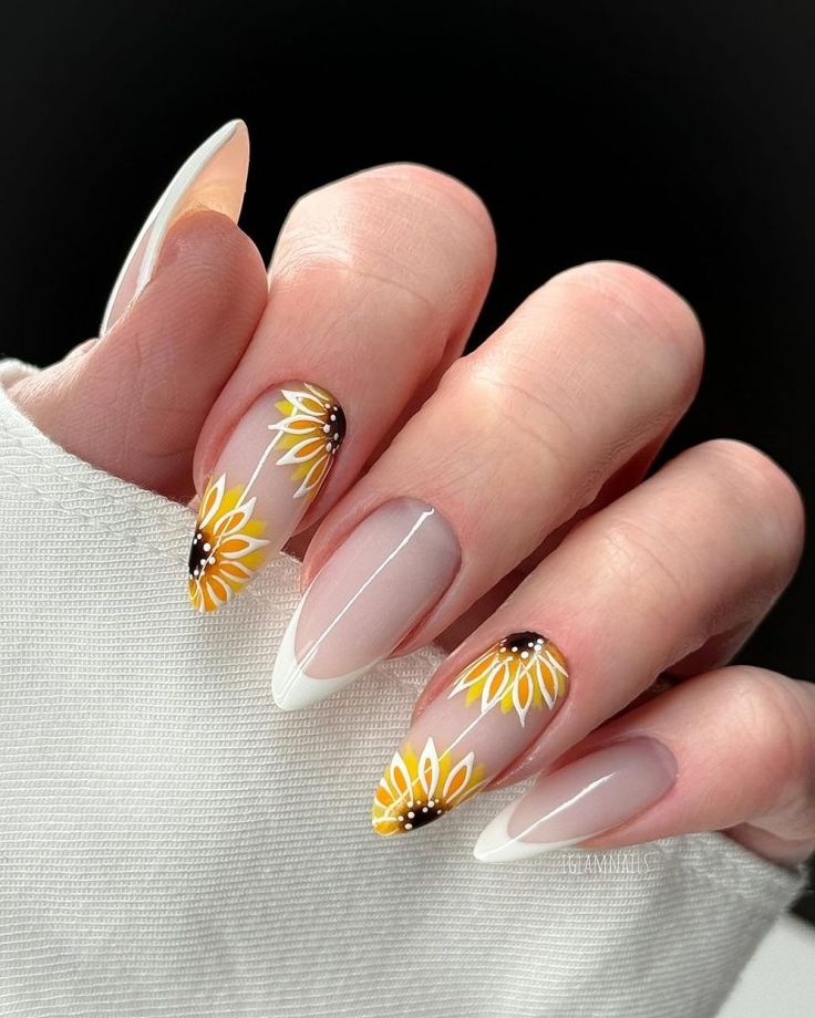 Elegant Floral Nail Design: Cheerful Sunflowers on a Nude Base with Classic French Tips.