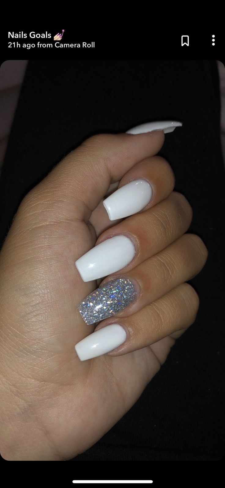 Chic White Manicure with Dazzling Glitter Accent Nail.