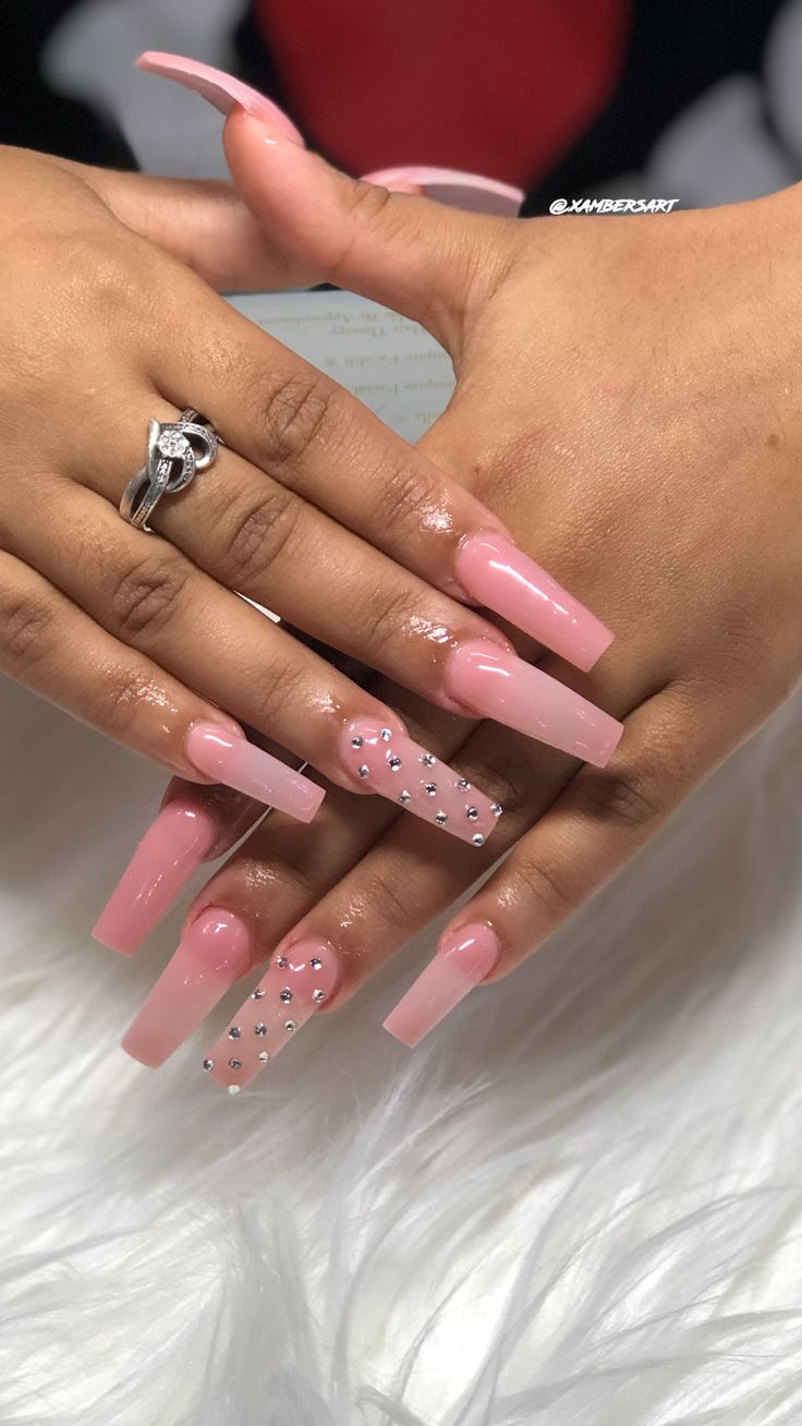 Sophisticated Soft Pink Long Nails with Glossy Finish and Glam Rhinestone Accents