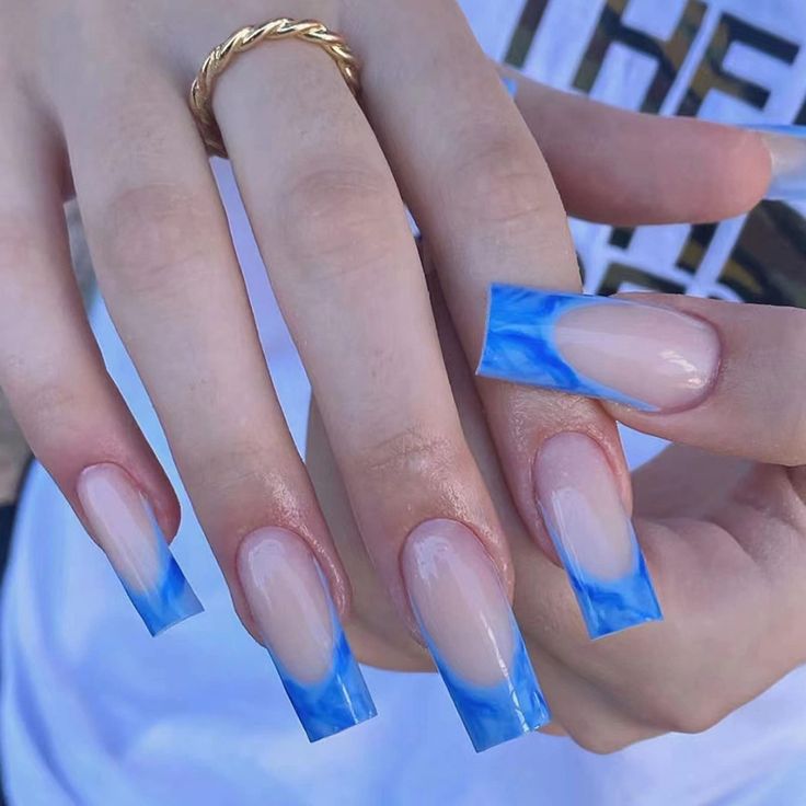 Versatile Stunning Blue Ombre Nail Design with Long Square Tips and Translucent Base.