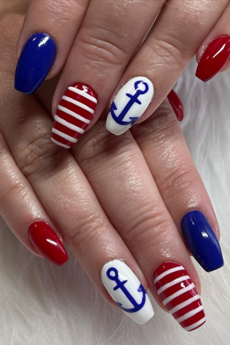 Vibrant Nautical Nail Design with Bold Colors and Playful Anchor Motif