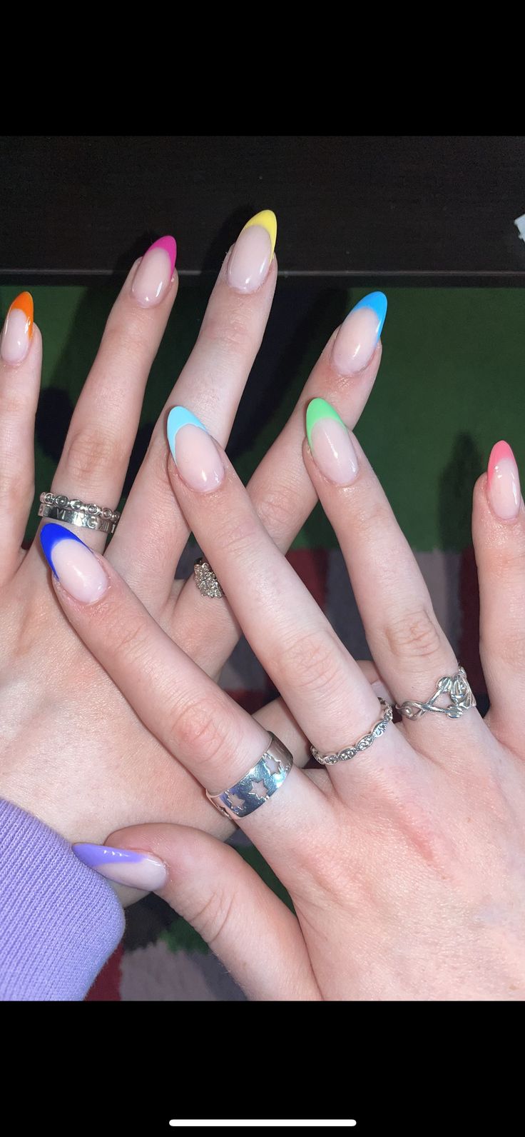 Chic and Playful Nail Art: A Trendy Blend of Colorful Tips.