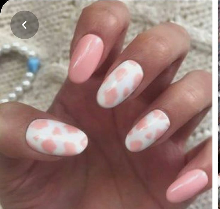 Charming Pink and White Nail Design with Pastel Leopard Accent.