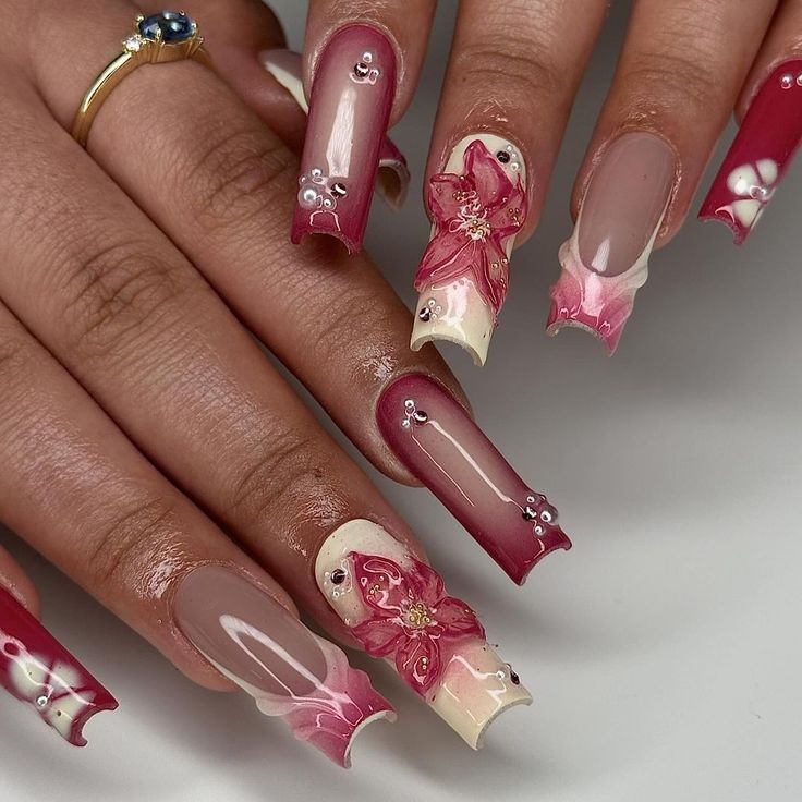 Elegant Floral Nail Art with Intricate Pink Flowers and Two-Tone Color Scheme