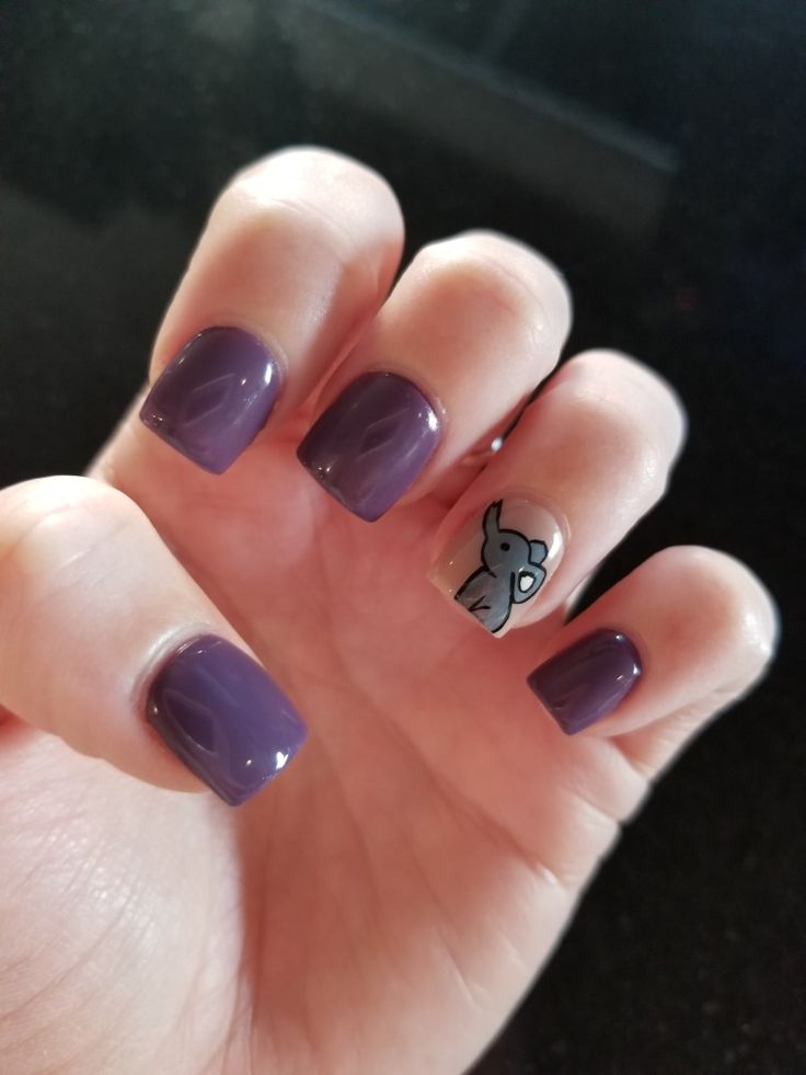 Elegant Chic Violet Nail Design with Whimsical Accent Character for Stylish Occasions.