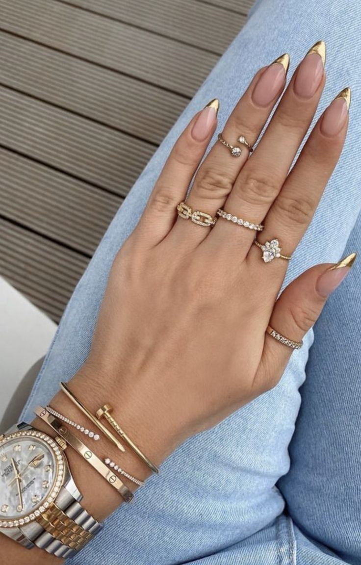 Chic Nude and Gold Nail Design: A Sophisticated Look for Any Occasion.