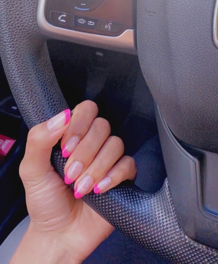 Sophisticated Elegant Pink French Tip Manicure with Vibrant Accents.