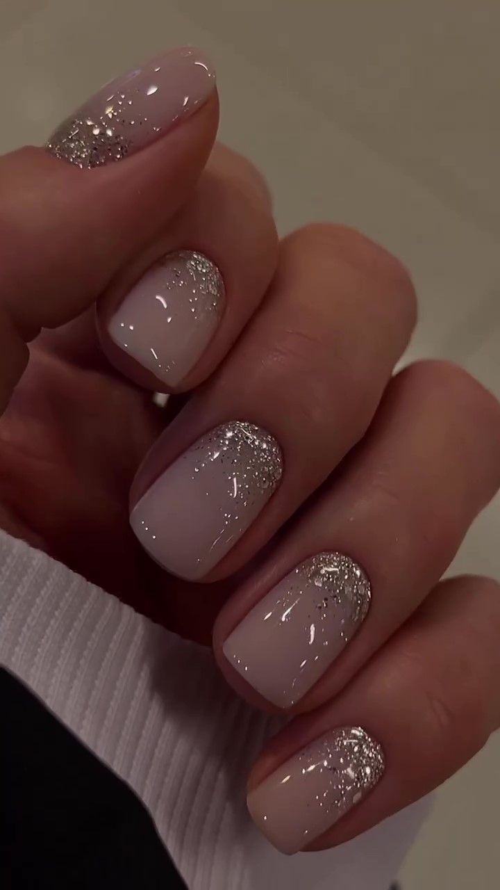 Chic Nude Nail Design with Subtle Glitter Gradient for All Occasions.