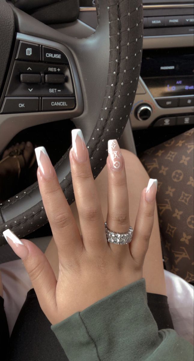 Chic French Tip Nails with Ombre Effect: A Stylish Balance of Elegance and Casualwear.