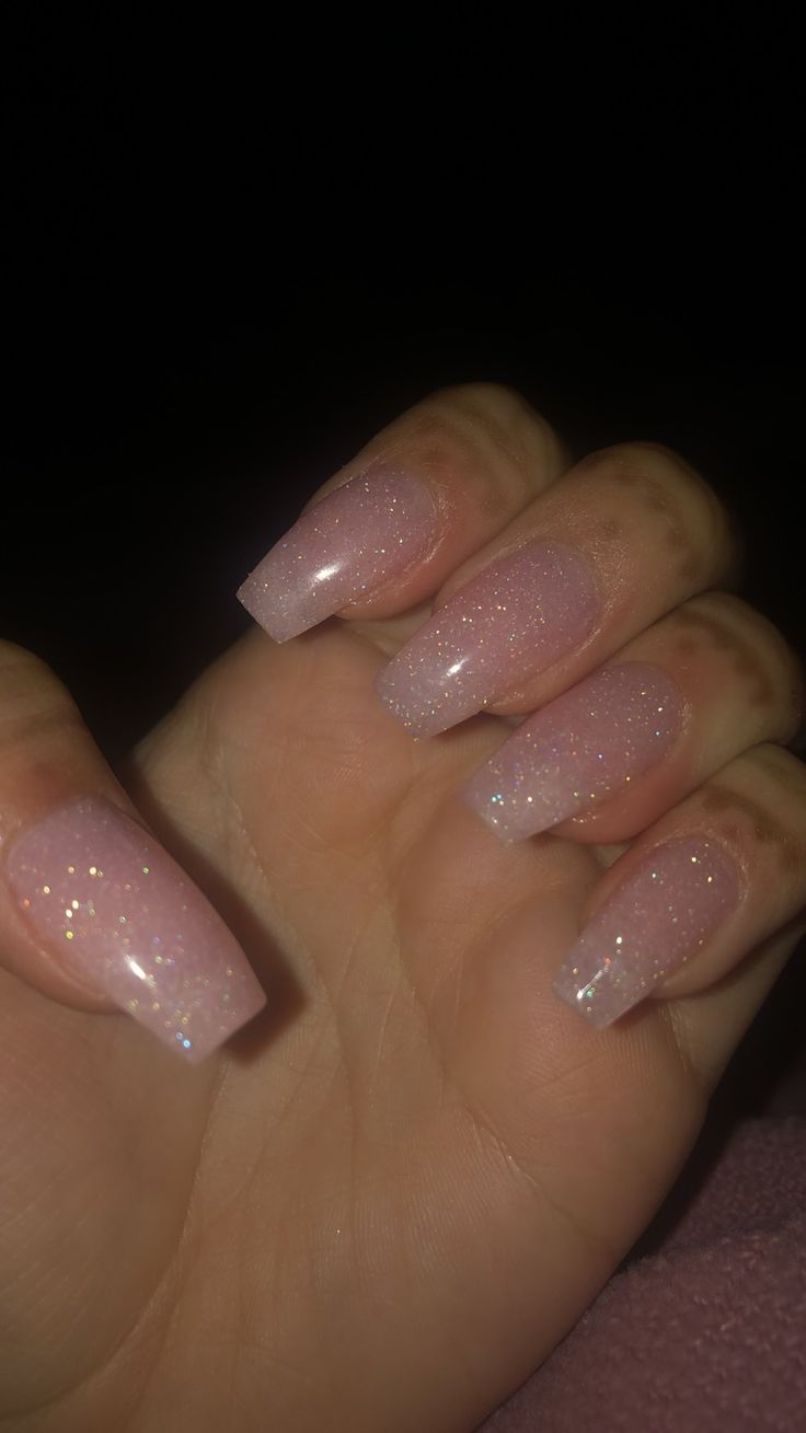 Chic Glittery Pink Ombre Nails for an Enchanting Look.