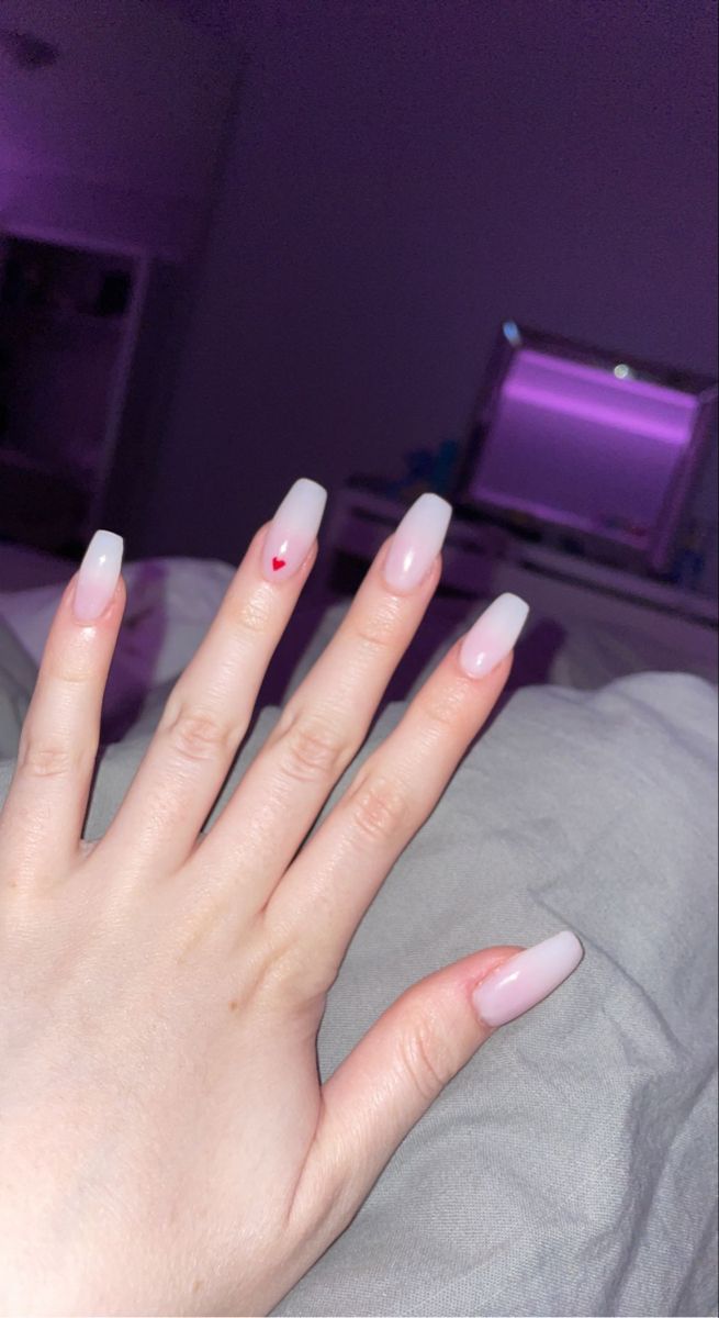 Chic Ombre Nail Design with Elongated Acrylics and Playful Heart Accent