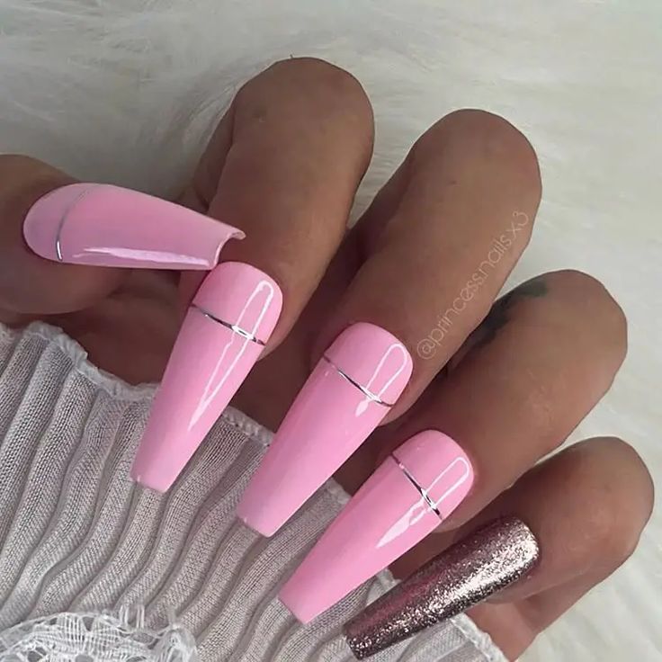 Chic Elegant Oval Nail Design with Soft Pink Polish and Silver Accents