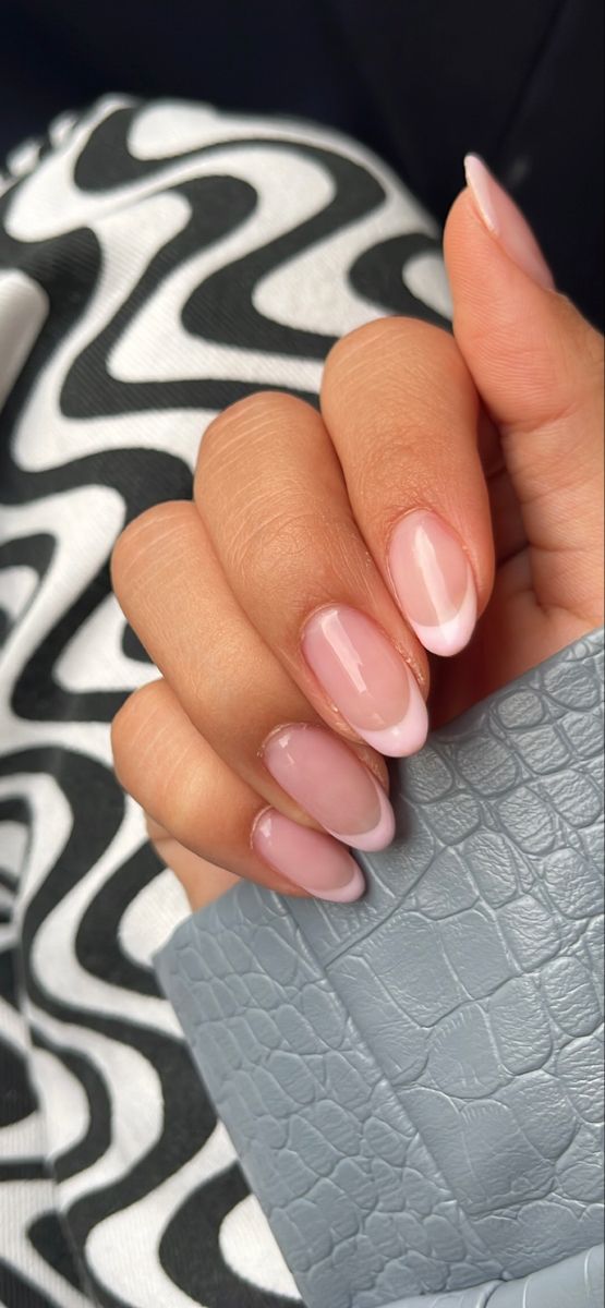 Elegant Nude French Manicure with Subtle White Tips for Timeless Chic.