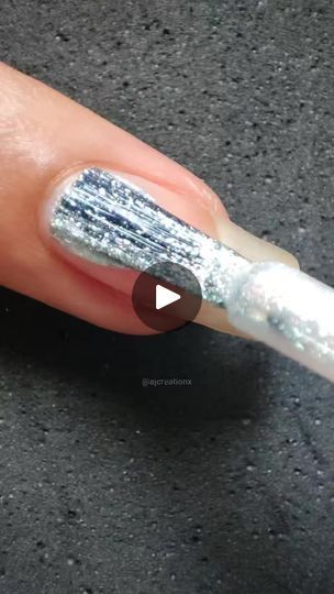 Glamorous Glittery Silver Nail Design for Elegant Manicures.