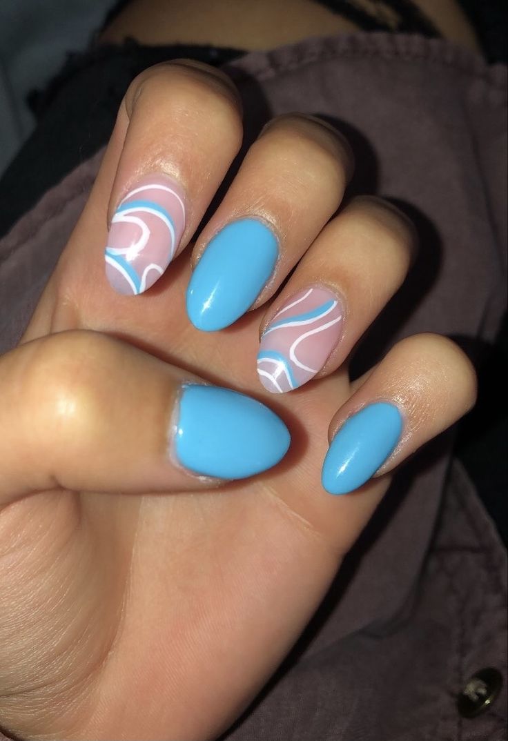 Vibrant Blue and Abstract Swirls: A Modern and Playful Nail Art Design