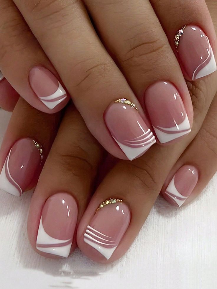 Chic Soft Nude French Manicure with White Tips and Gold Accents