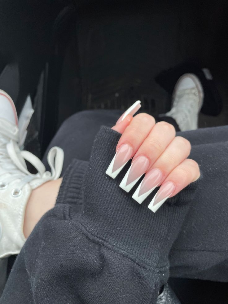 Chic Long Nail Design with Nude Base and Striking White Edges