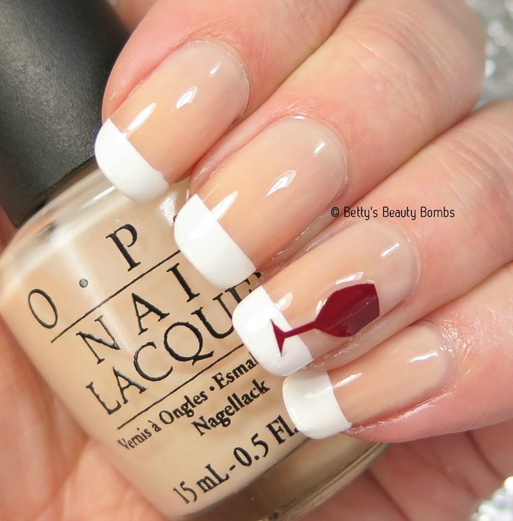 Sophisticated French Manicure with Whimsical Wine Glass Accent Nail.