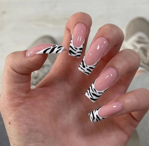 Chic Zebra-Striped Nail Art: Bold Elegance with Pink Base and Square Shape.