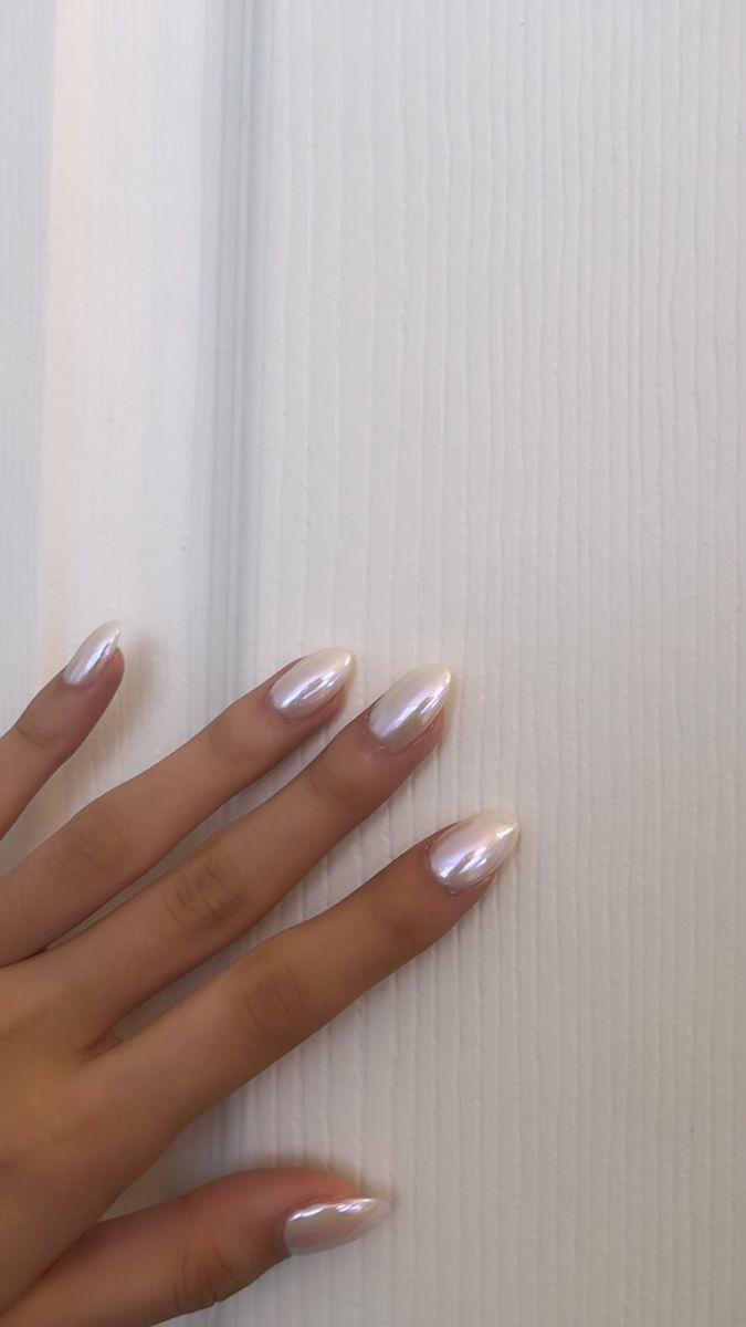 Sophisticated Almond-Shaped Nails with Pearlescent Finish and Elegant Gradient.