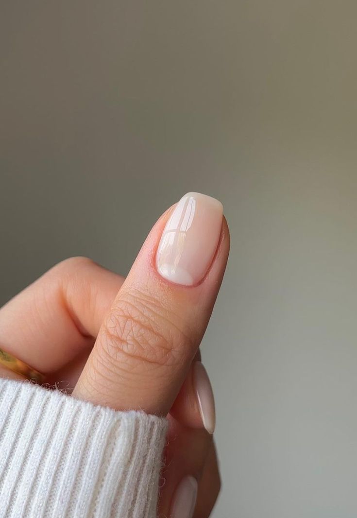 Sophisticated Soft Glossy Nude Nail Design for Any Occasion