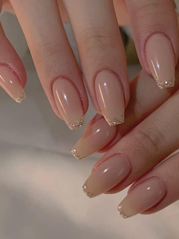 Chic Elegant Nude Nails with Subtle Sparkle: Versatile for Any Occasion