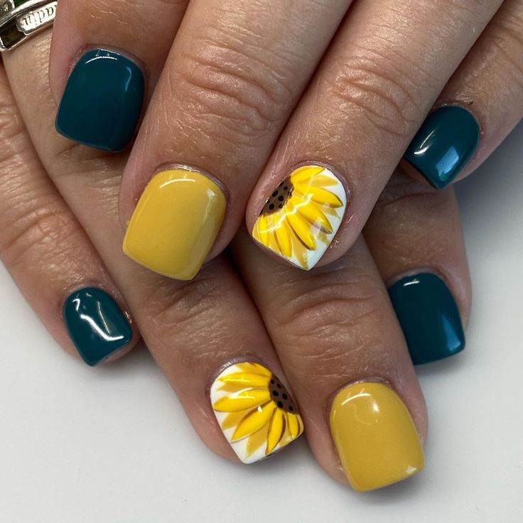 Playful Teal and Sunny Yellow Nail Design with Hand-Painted Sunflower Accents.