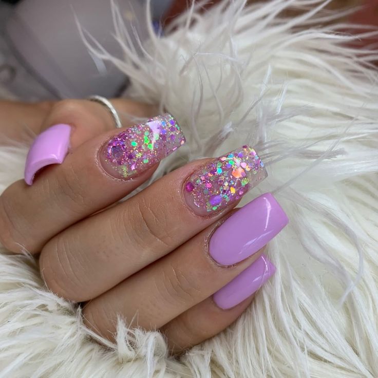 Glamorous Glittering Pink Nail Design with Holographic Accents.