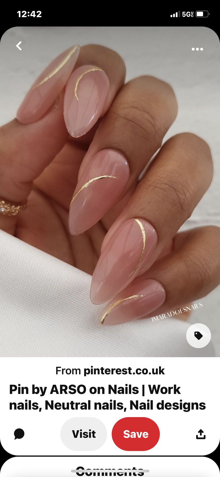 Sophisticated Minimalist Nail Design with Nude Base and Delicate Gold Accents