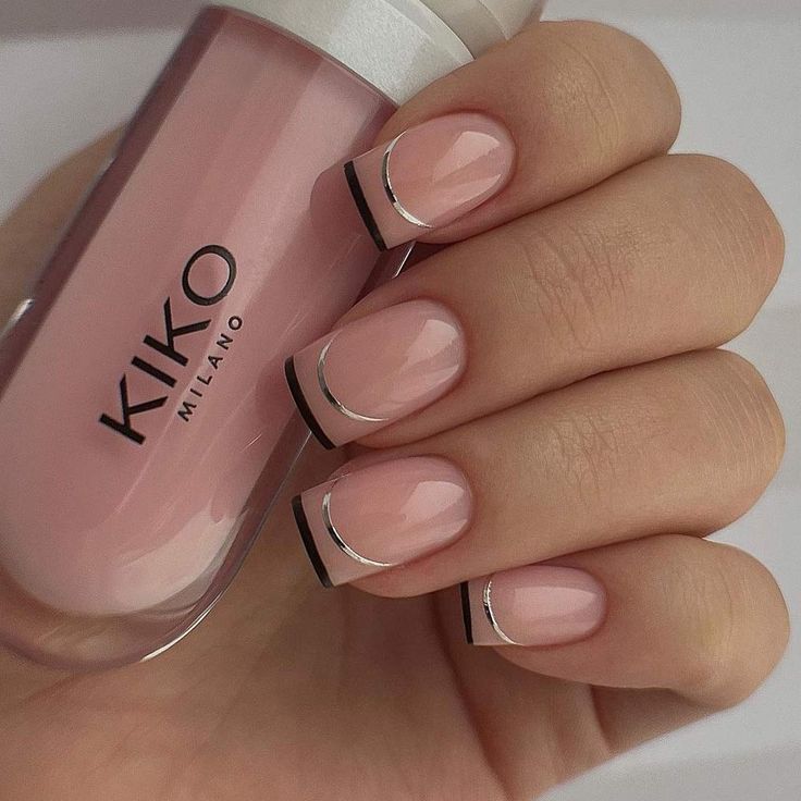 Elegant Chic: Soft Pink Base with French Tips and Silver Accents Manicure