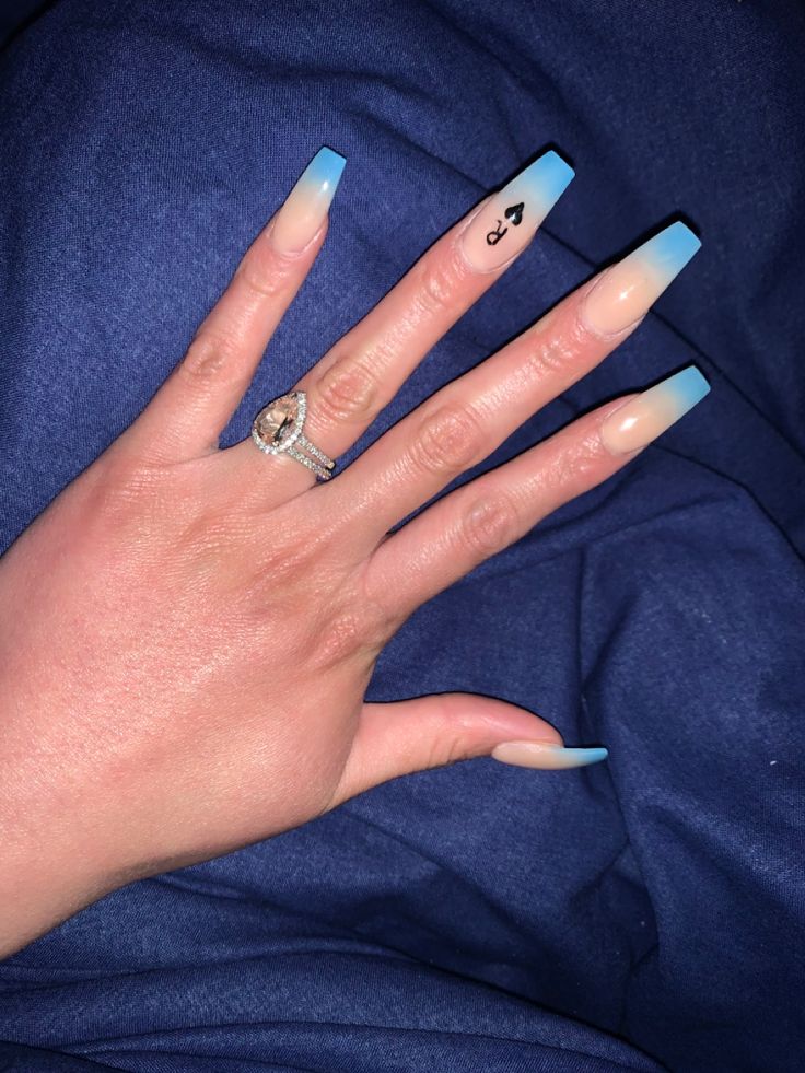 Elegant Almond-Shaped Nails with Gradient from Nude to Sky Blue and Personalized Accent Detail