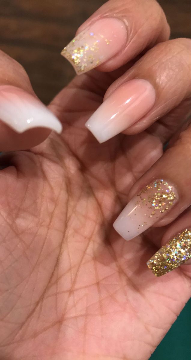 Sophisticated Ombre Nail Design with Subtle Gold Glitter Accents