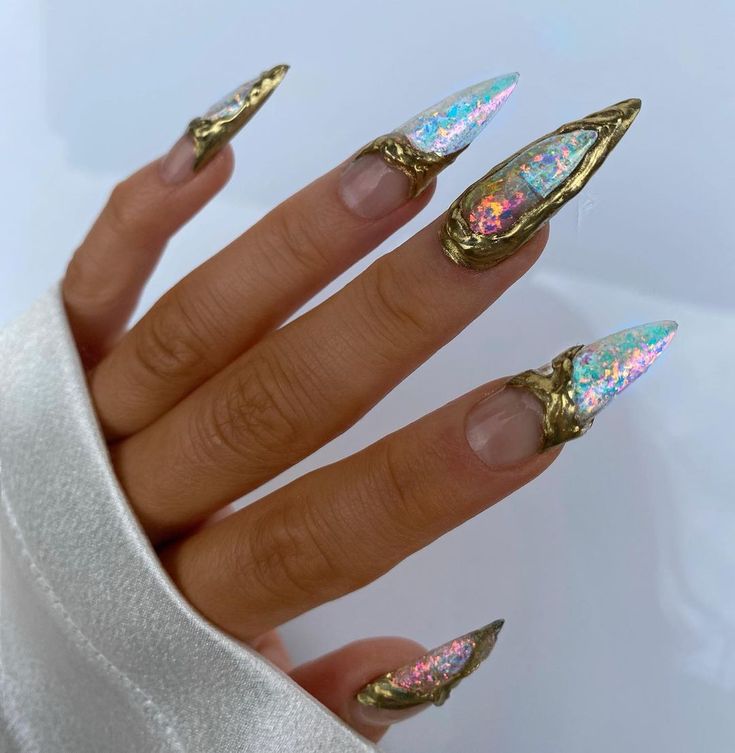 Dramatic Iridescent Long Nails with Metallic Accents and Gold Embellishments.