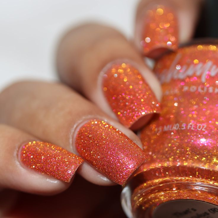 Vibrant Holographic Orange Nail Design for Festive Celebrations