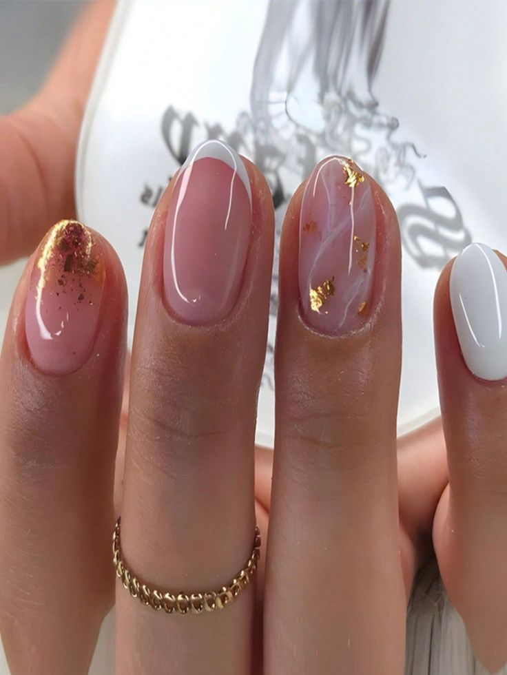 Sophisticated Nail Design: Soft Pink, Glossy White, and Gold Accents for Any Occasion.