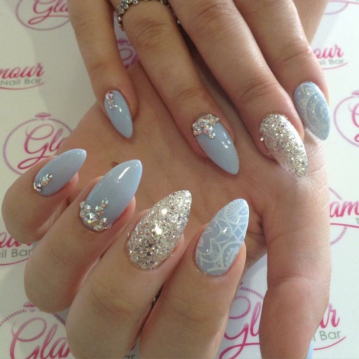 Elegant Almond-Shaped Manicure with Pastel Blue and Shimmering Silver Accents