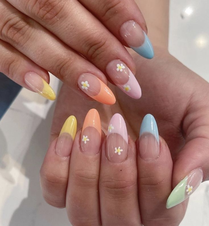 Playful Floral Pastel Almond Nails: A Cheerful Spring-Inspired Manicure.