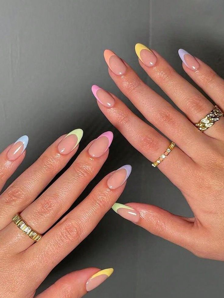 Playful Pastel Ombre Nail Design with Elegant Ring Accents