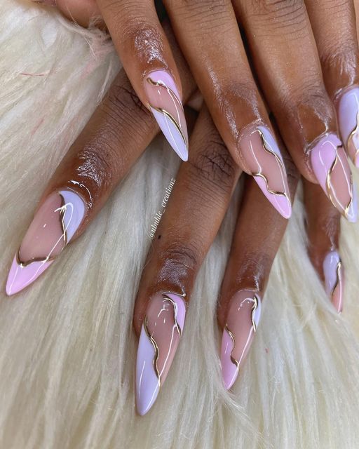 Sophisticated Pastel Nail Art with Gold Detailing for a Fashion-Forward Look.