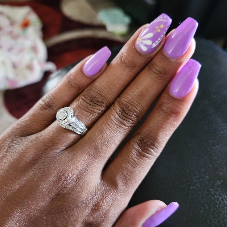 Chic Lavender Nails with Floral Accents and Stunning Engagement Ring.