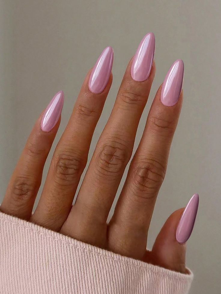 Chic Soft Pastel Pink Almond-Shaped Nails: Elegant and Feminine.