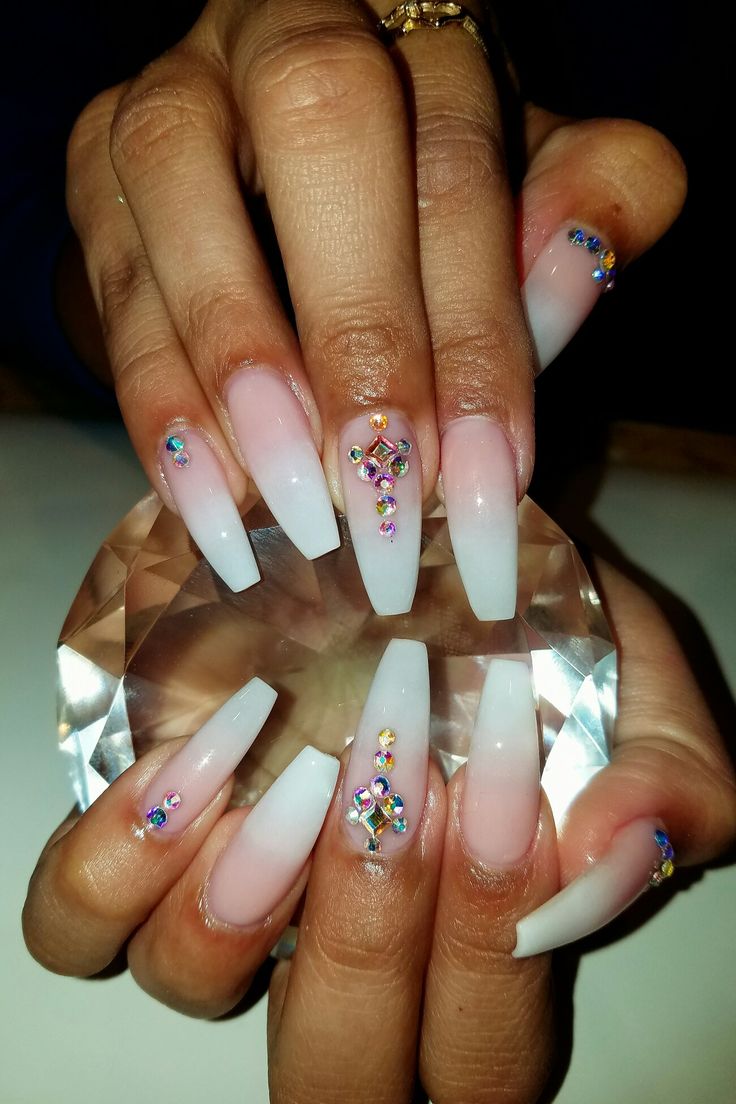 Stunning Ombre Nails: Soft Pink to White with Glam Rhinestone Accents