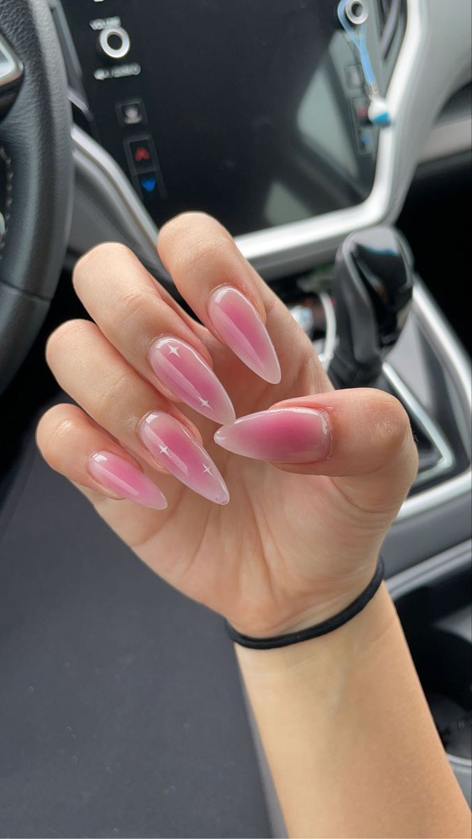 Chic Almond-Shaped Nails: Elegant Gradient in Soft Pinks with Sophisticated White Accents.