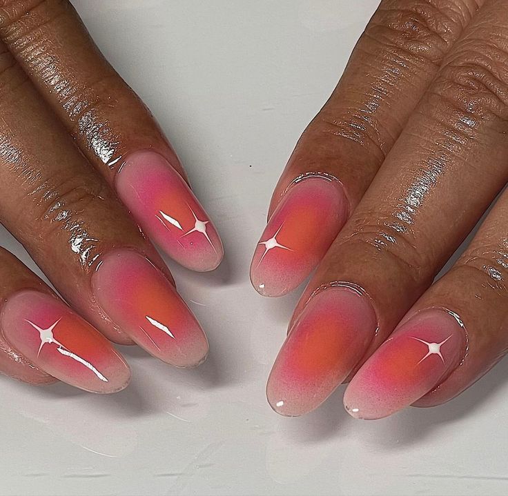 Captivating Ombre Nail Design: Coral and Pink Hues with Glossy Accents