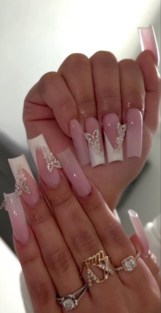 Sophisticated Elegant Nail Design with Soft Pink, White, and Butterfly Accents.