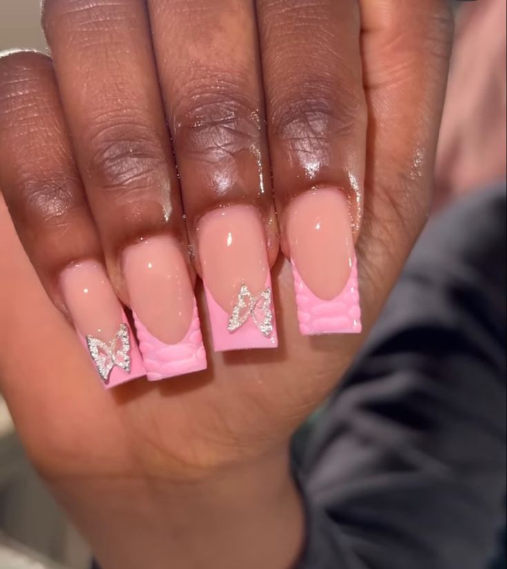 Elegant Textured Pink Acrylic Nails with Silver Butterfly Accents