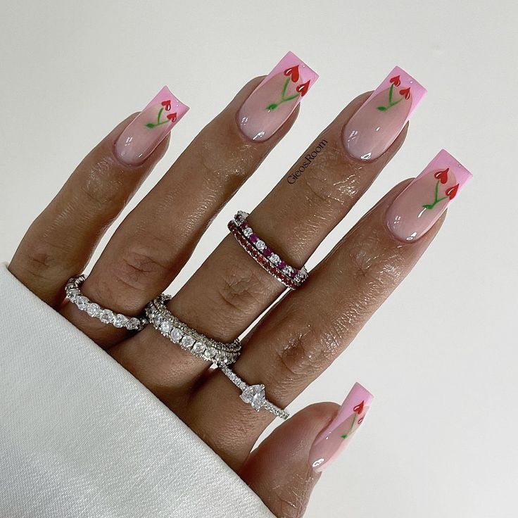 Chic Floral Nail Design with Pink Gradient and Red Tulip Motifs.