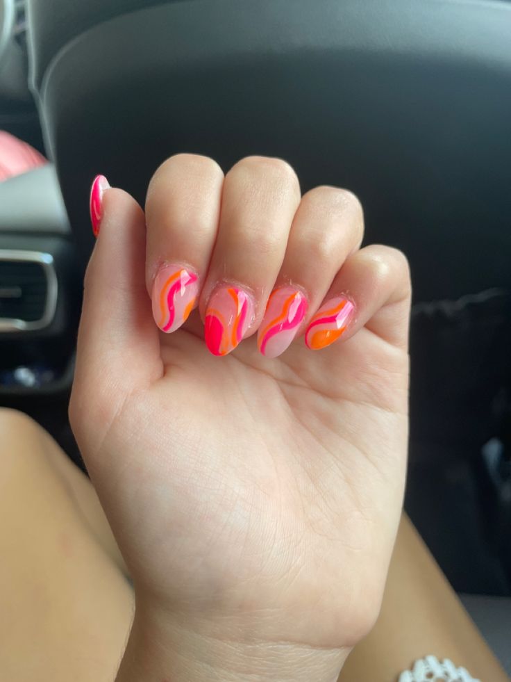 Vibrant Swirl Nail Art: A Playful Statement for Any Outfit