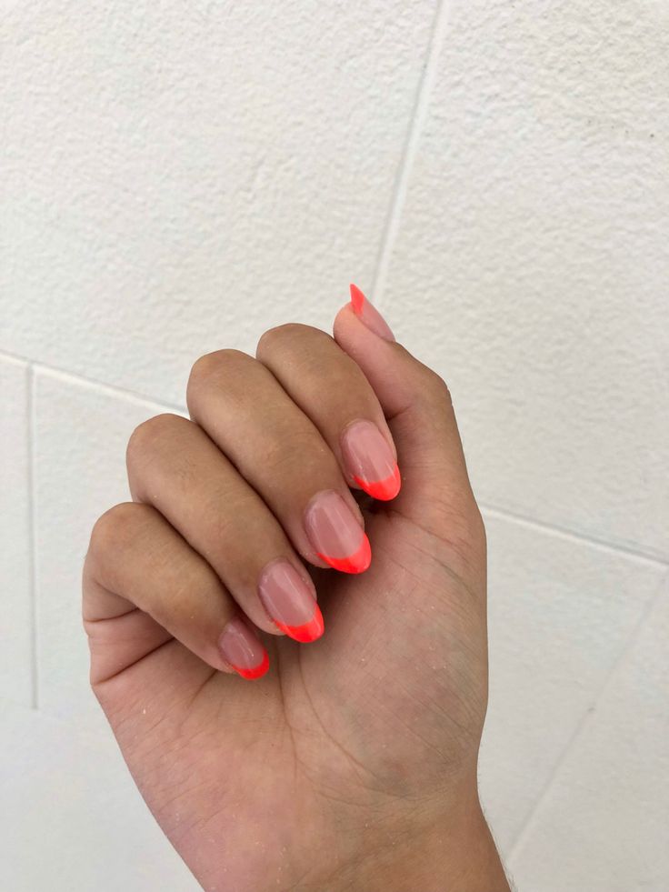 Vibrant Neon Orange Ombre French Tips: A Bold and Elegant Summer Nail Design