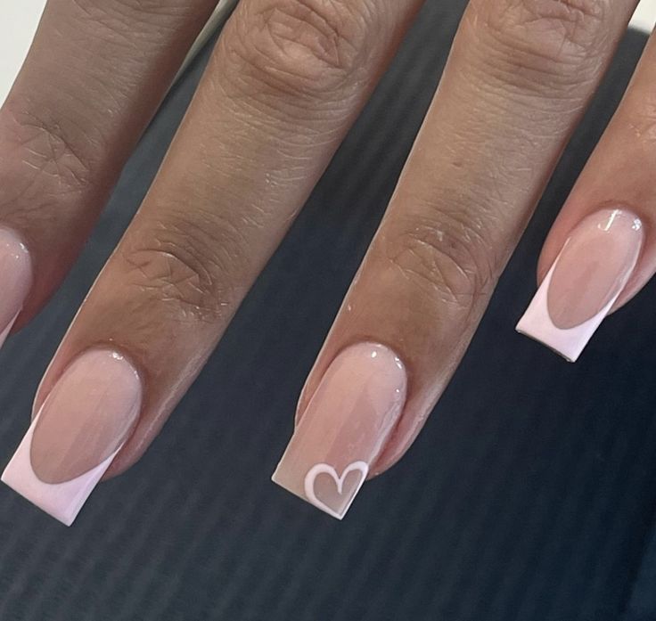 Charming Soft Pink Gradient Nail Design with Heart Motifs